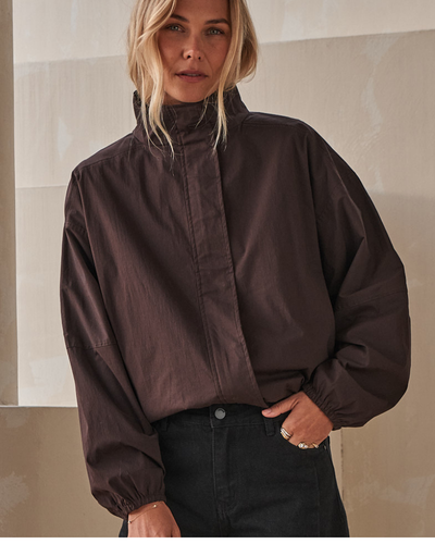 dark brown long sleeve shirt with boxy fit and high collar for a clean, effortless look