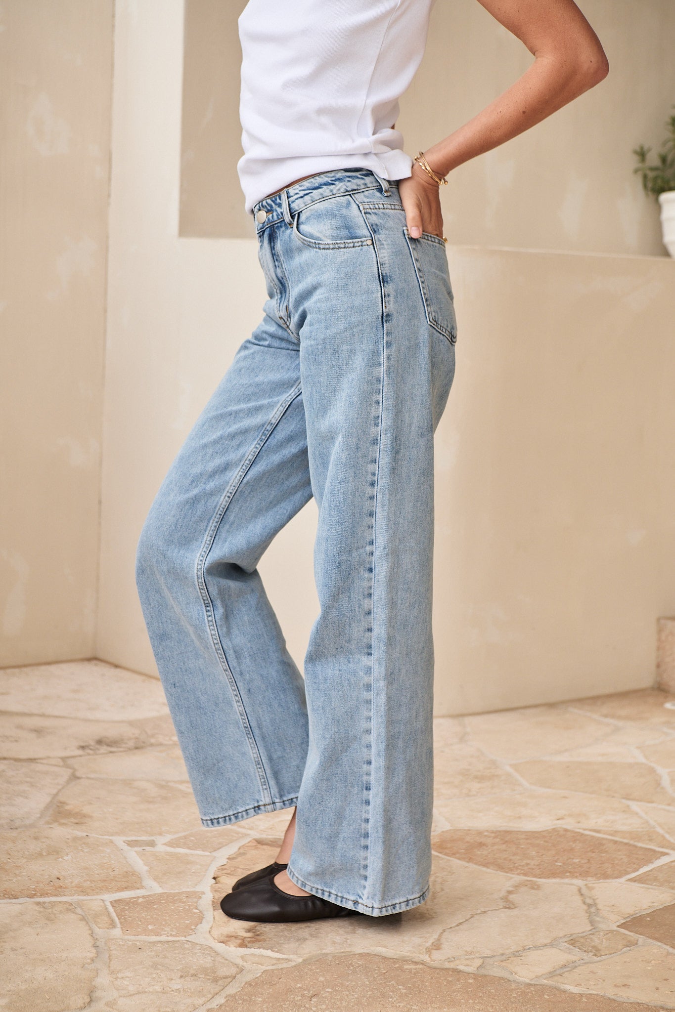 Mid Rise Wide Leg Jean - Light Blue in rigid denim with a fitted waist and wide leg for clean, sharp shape.