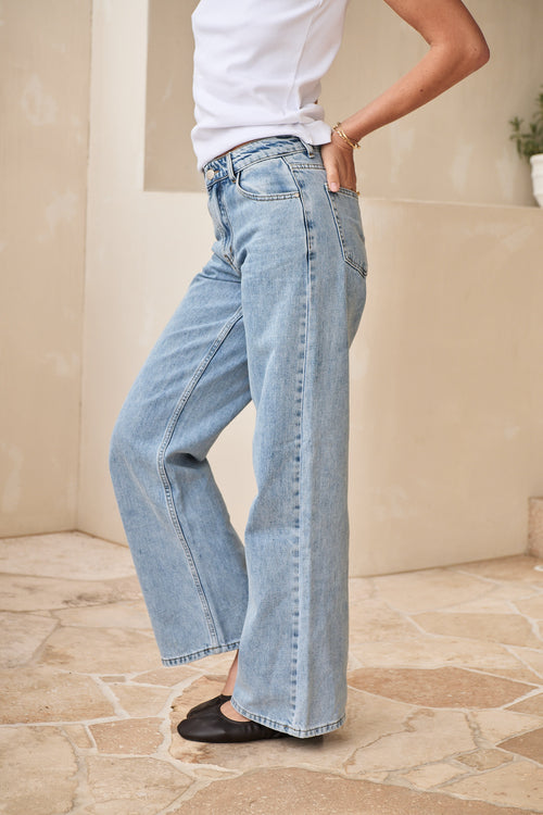 Mid Rise Wide Leg Jean - Light Blue in rigid denim with a fitted waist and wide leg for clean, sharp shape.
