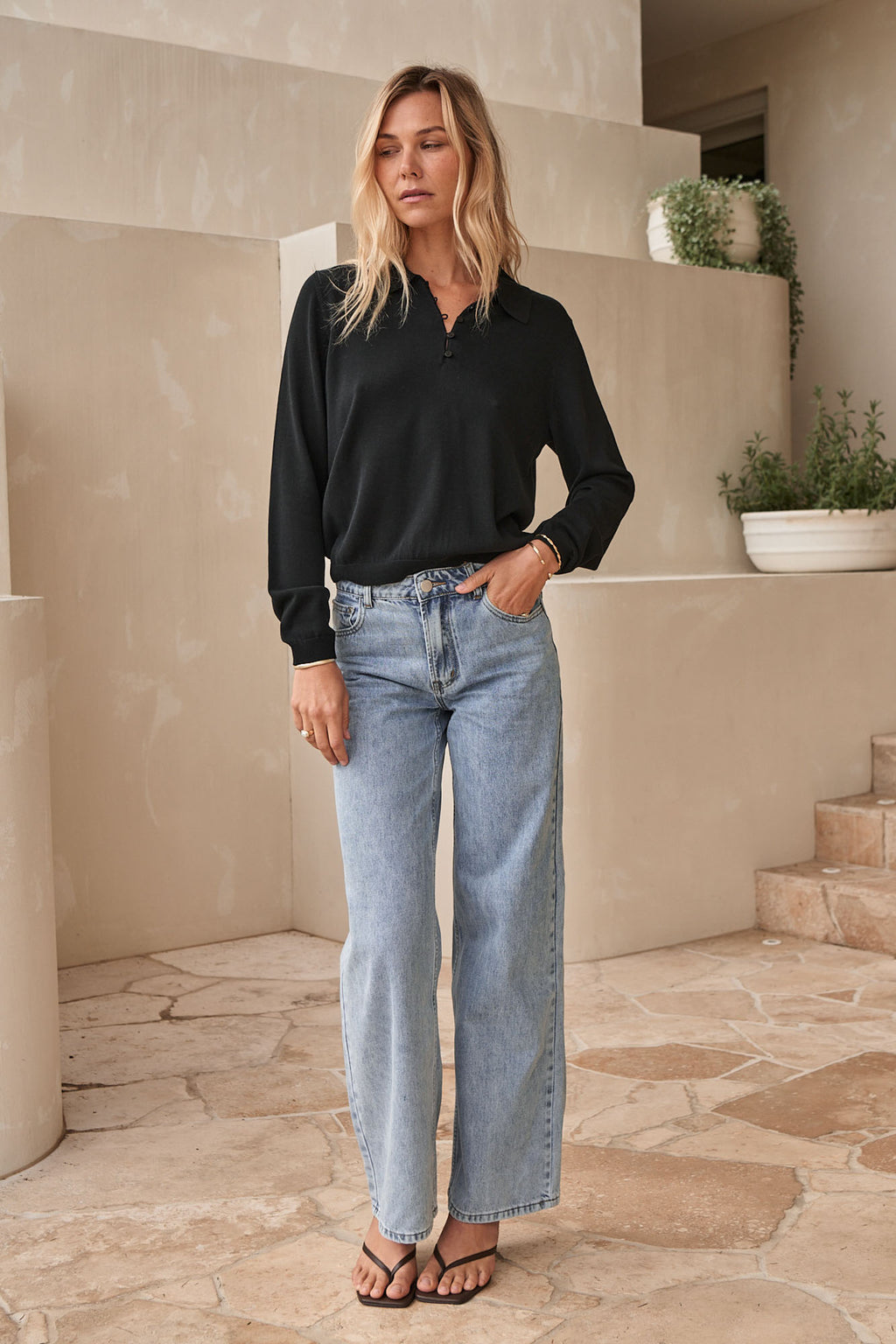 Mid Rise Wide Leg Jean - Light Blue in rigid denim with a fitted waist and hips and wide, clean legs for a sharp silhouette.