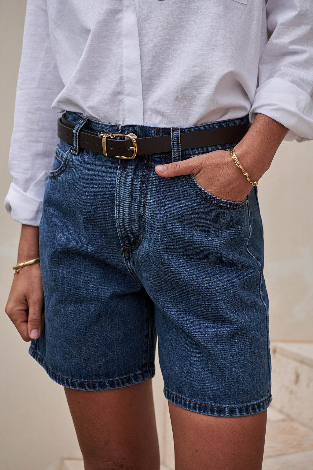 Mid Rise Denim Short - Washed Indigo in rigid denim with a classic indigo wash and structured fit that holds its shape all day.