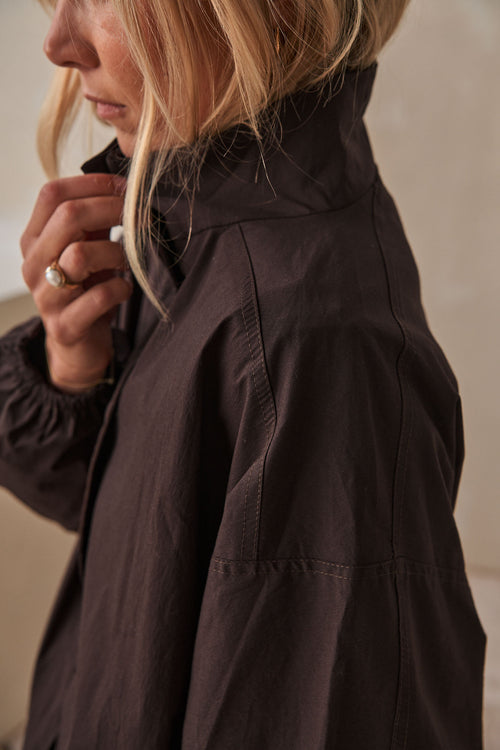 Nylon Track Jacket - Chocolate in durable nylon with a high collar and relaxed fit for easy layering.