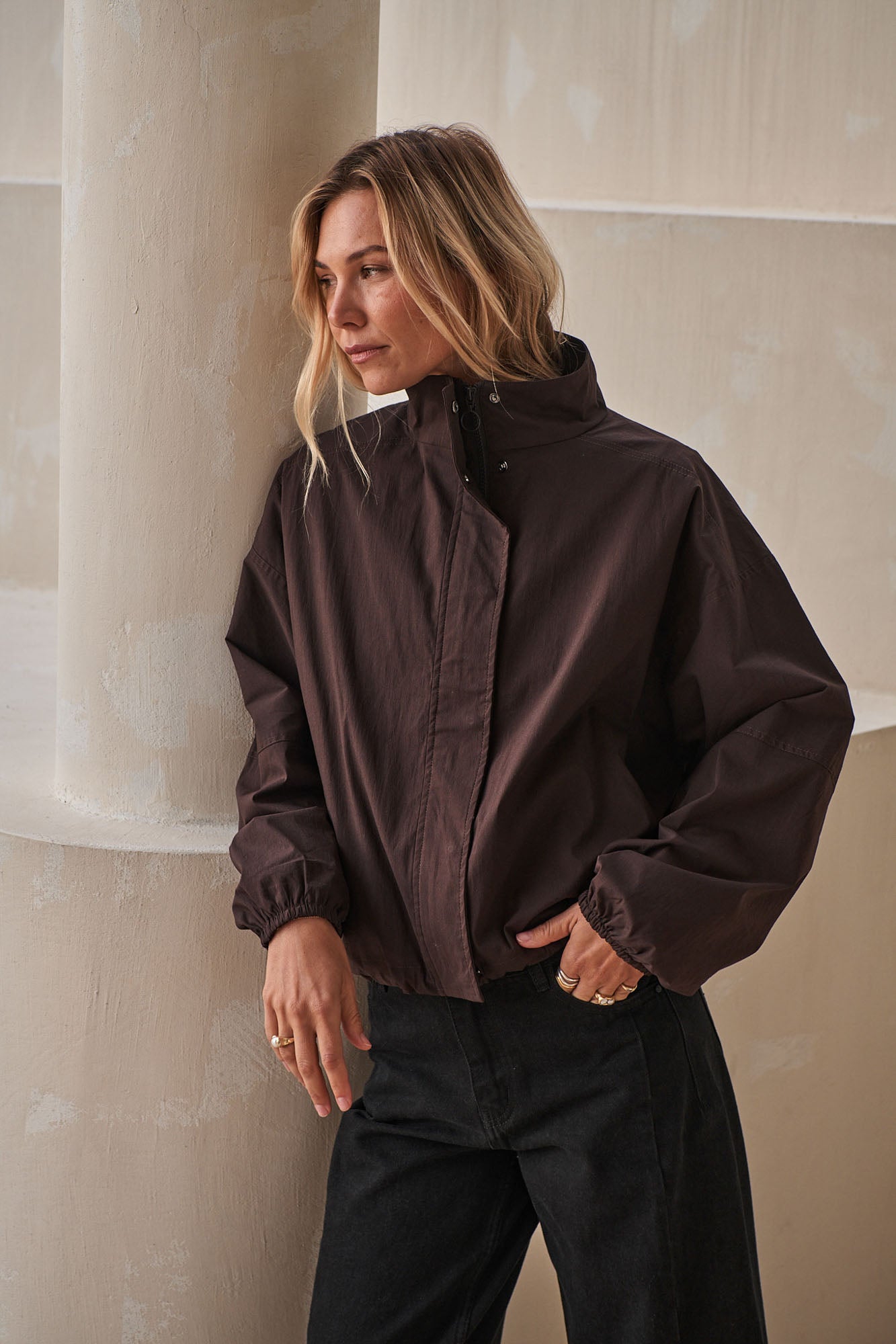 Nylon Track Jacket - Chocolate in lightweight nylon with an adjustable hem and stand collar for a neat finish.