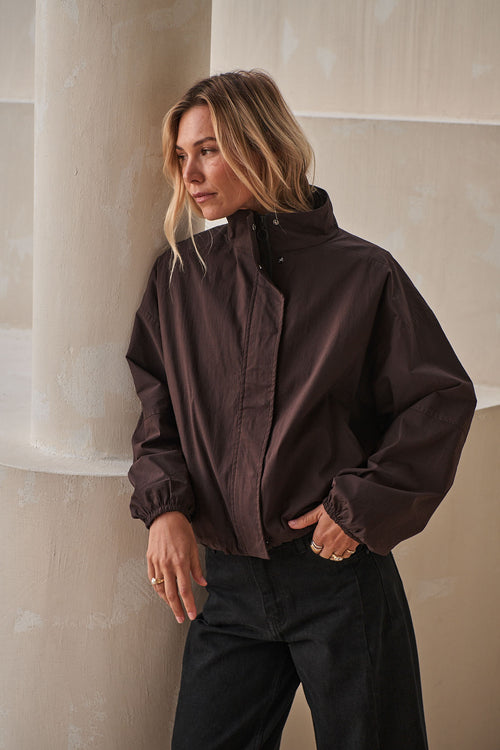 Nylon Track Jacket - Chocolate in lightweight nylon with an adjustable hem and stand collar for a neat finish.