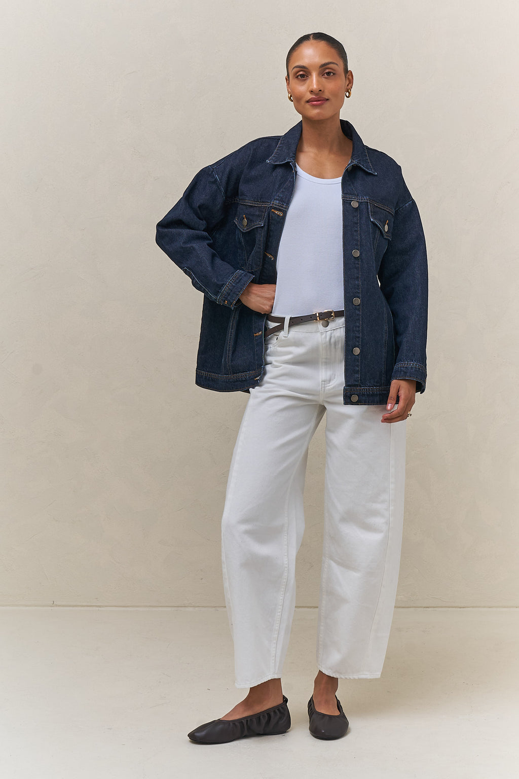 Denim trucker jacket - indigo in rigid denim with a clean, structured silhouette and classic button front.