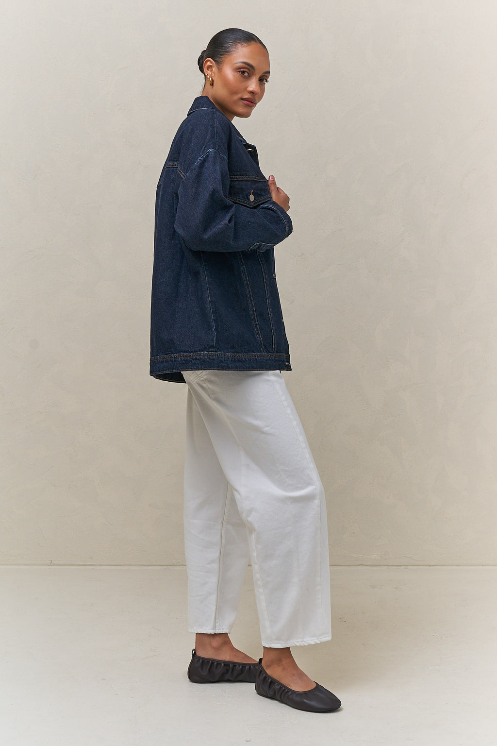 Denim Trucker Jacket - Indigo in rigid denim with a clean silhouette that holds its shape over time.