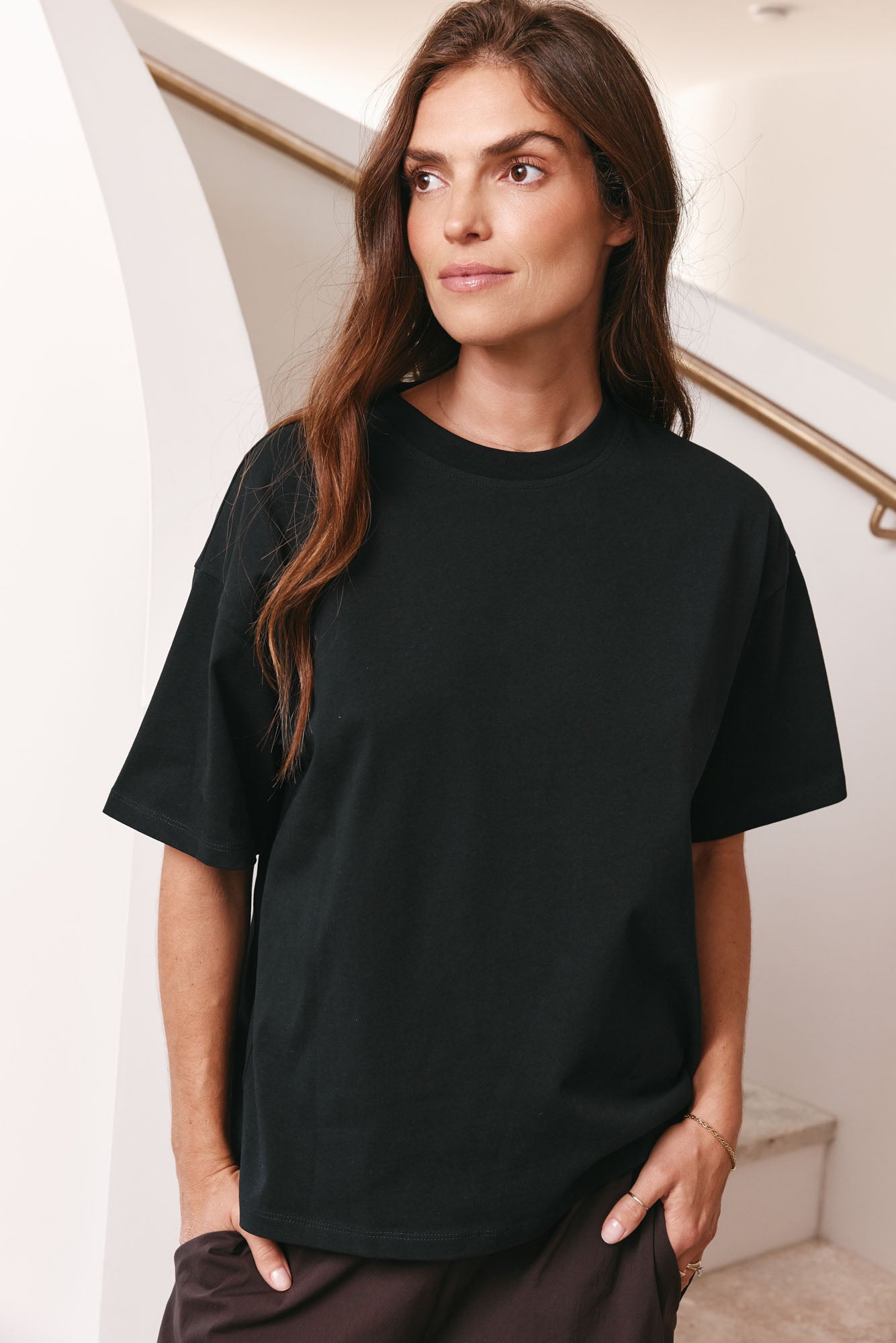 Relaxed Crew T Shirt - Black in mid-weight cotton with a slightly loose fit that keeps its shape over time.