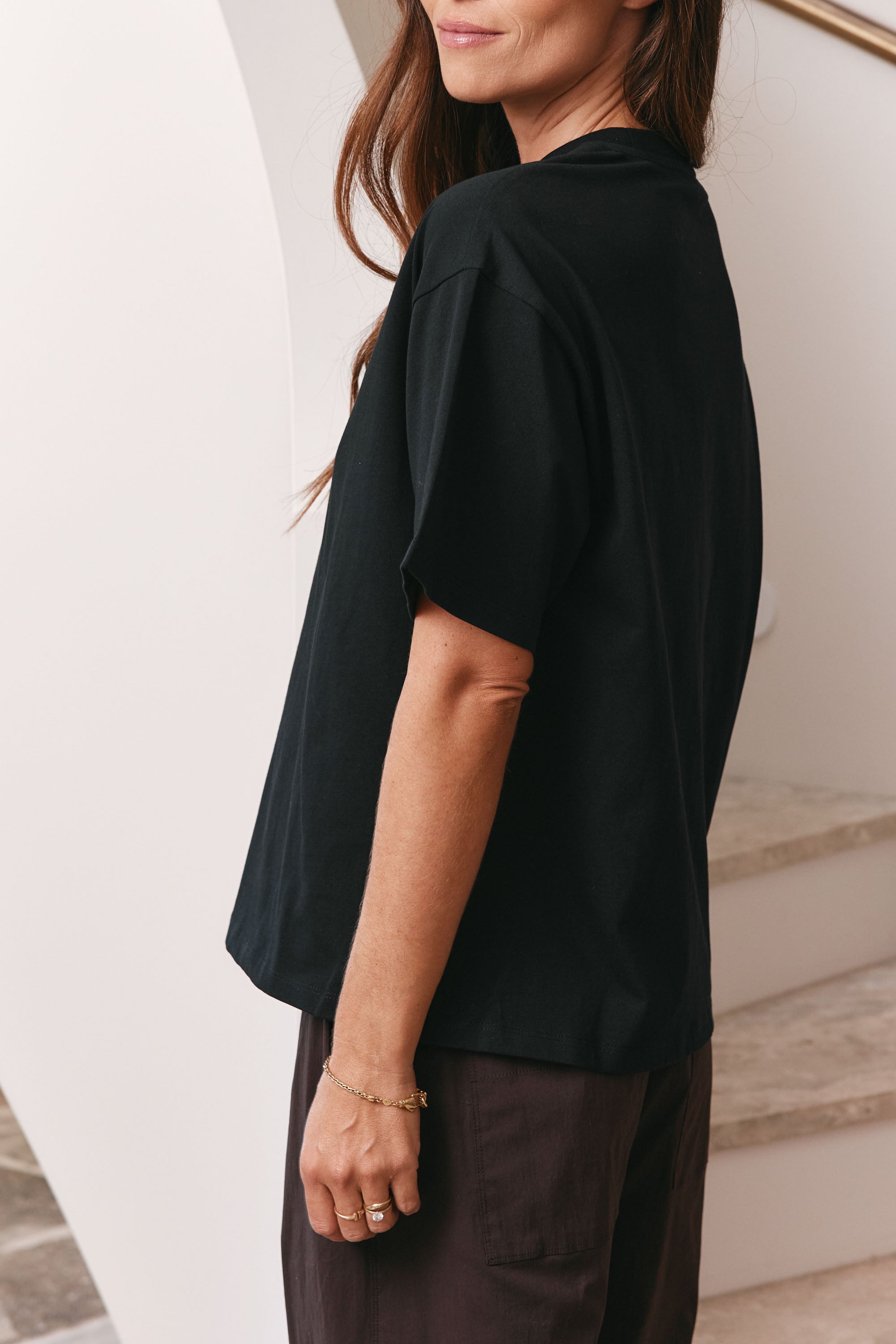 Relaxed Crew T Shirt - Black in mid-weight cotton with a boxy silhouette that holds its shape over time.