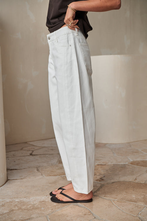 Mid Rise Barrel Jean - White in rigid denim with a fitted hip and rounded leg for easy, comfortable wear.