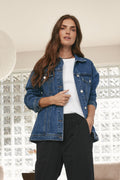 Denim trucker jacket - mid blue in rigid denim with a clean silhouette and structured fit for timeless casual layering.