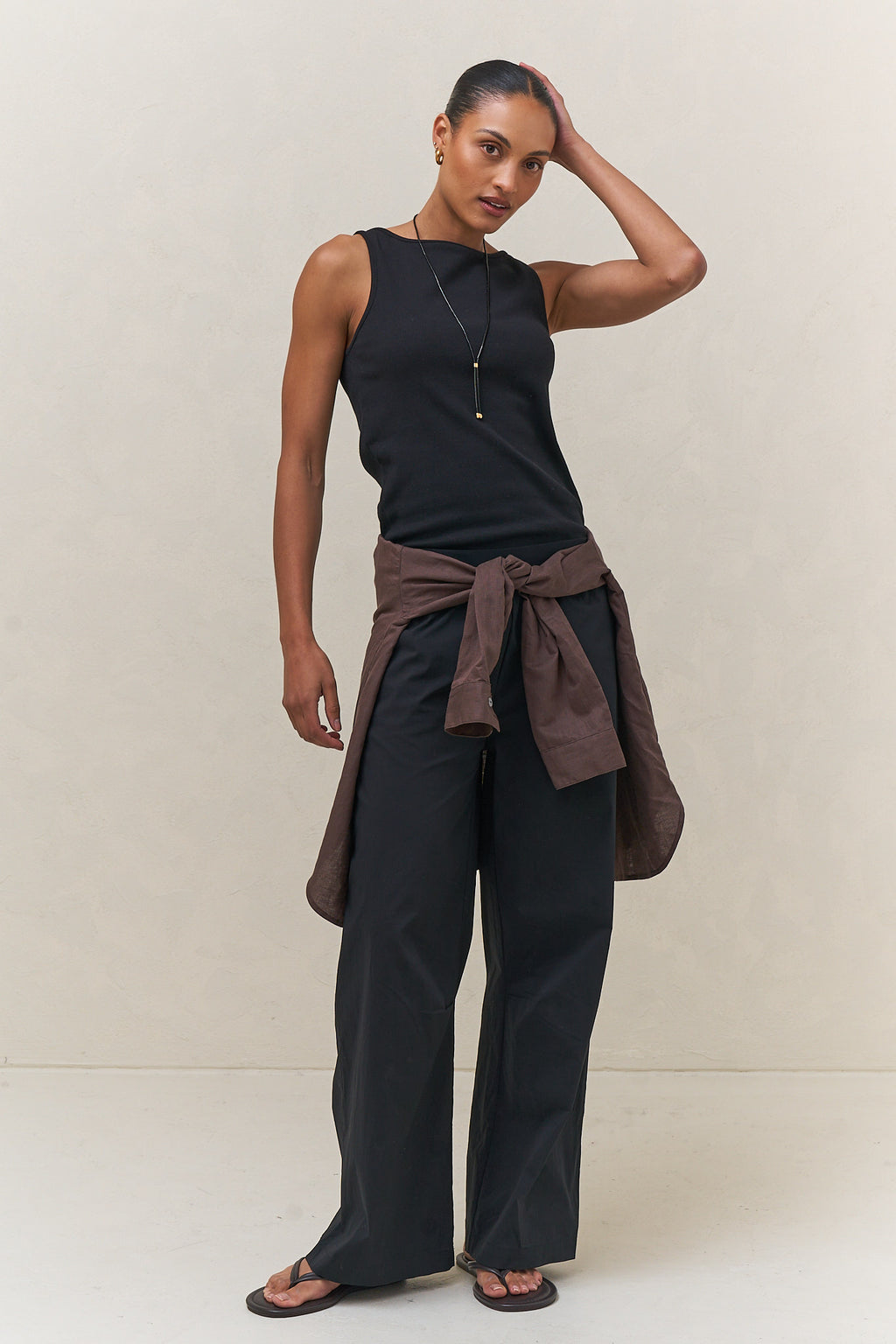 Boat Neck Rib Tank - Black in a soft rib knit with a relaxed fit and clean boat neckline for easy layering.
