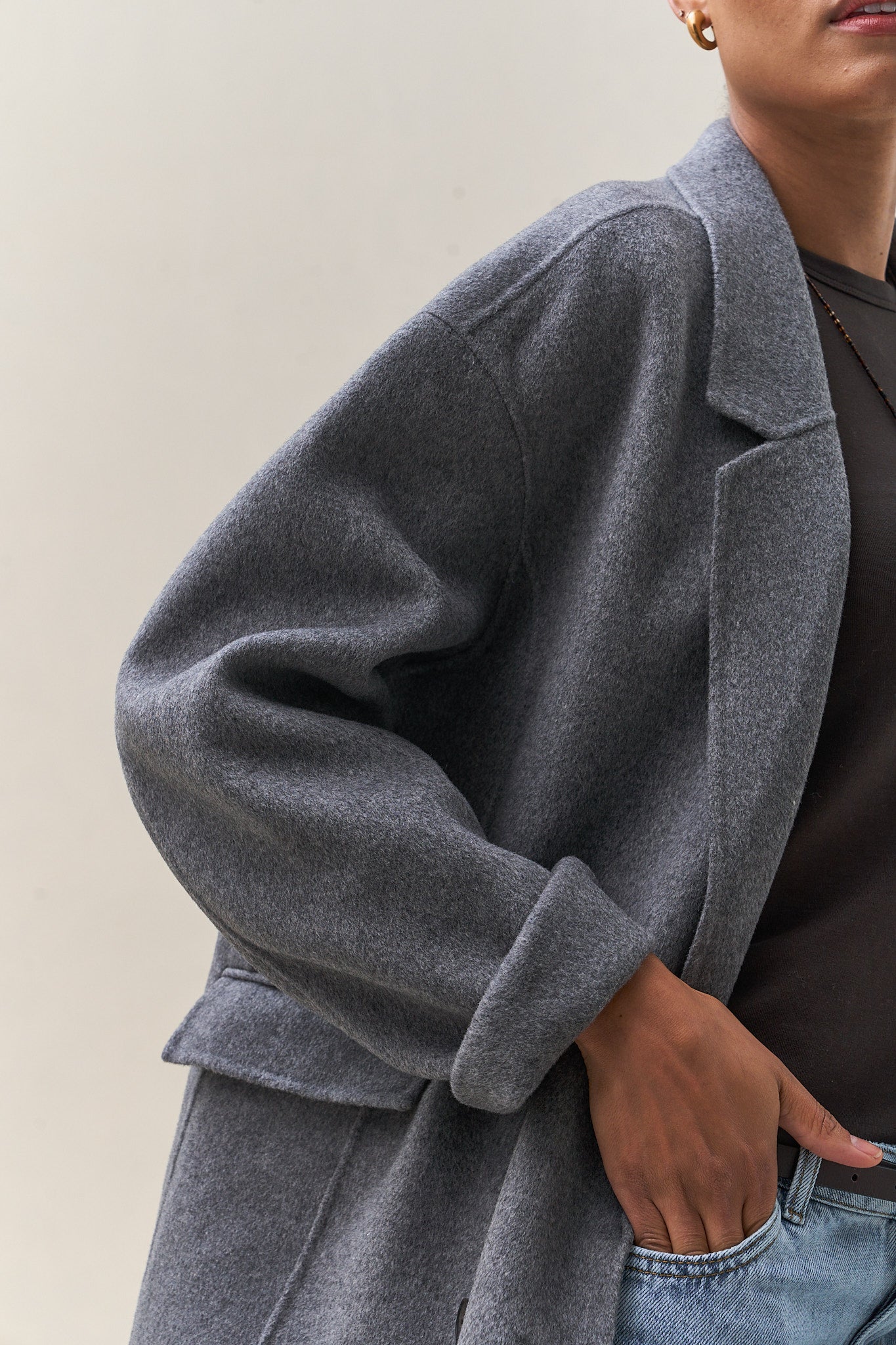 Double Breasted Wool Blazer - Charcoal in soft wool with a relaxed fit and clean bonded seams for a polished everyday layer.