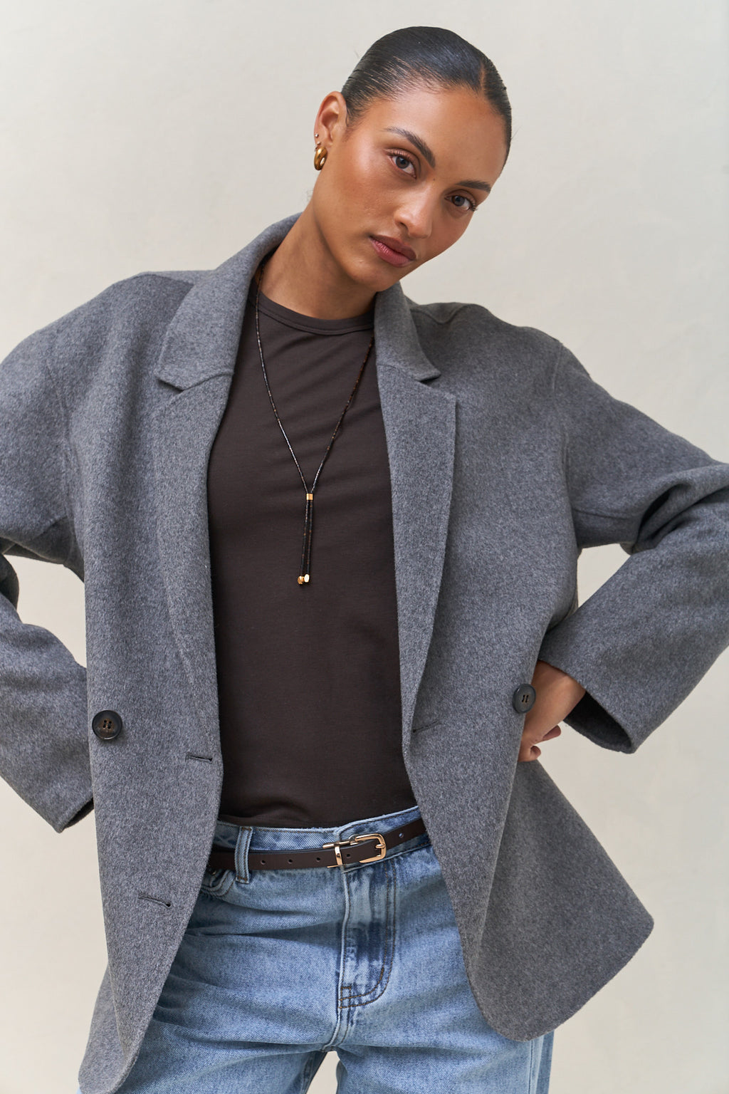 Double Breasted Wool Blazer - Charcoal in soft wool with a structured, oversized fit and clean, bonded seams for a polished look.