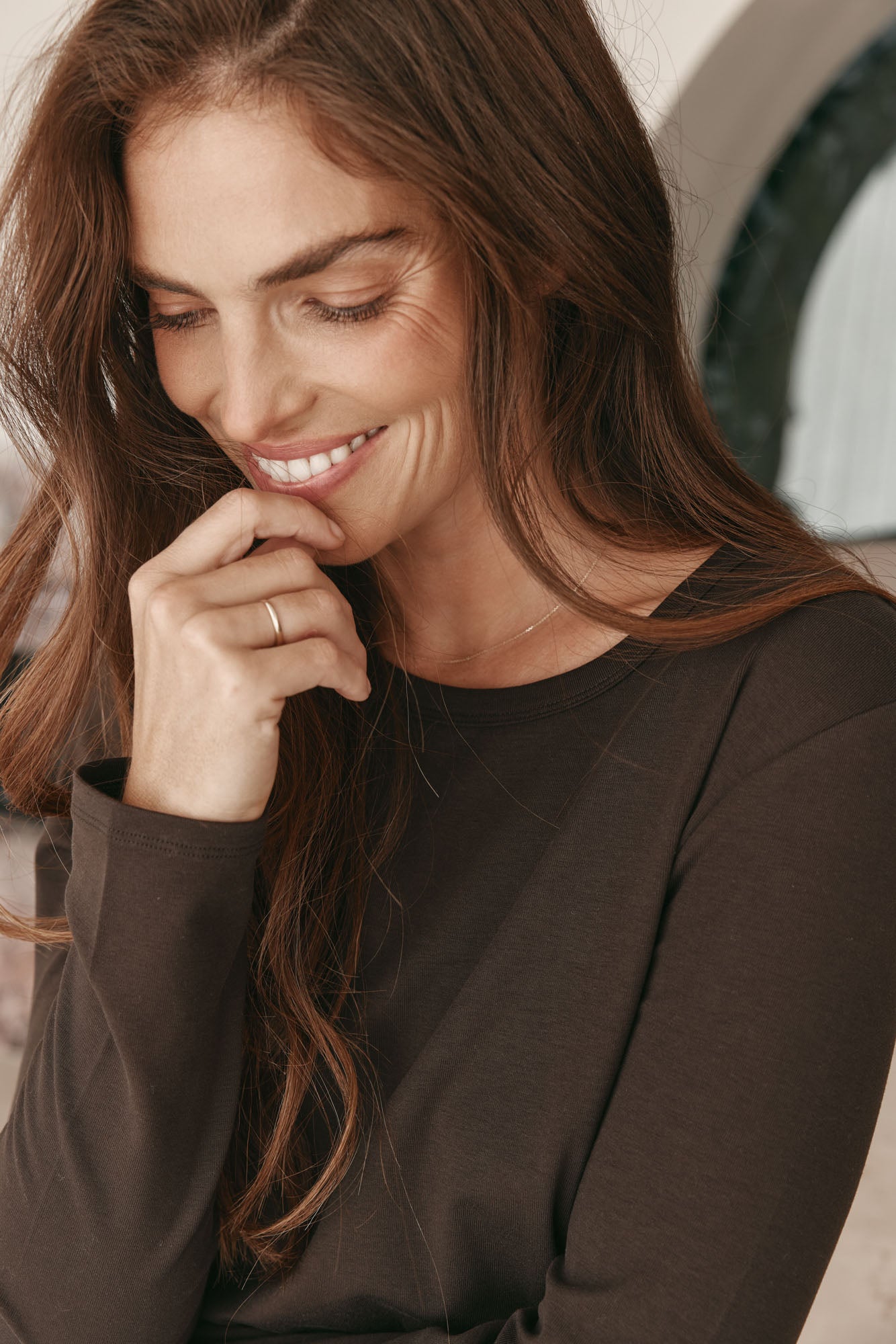 Basic Long Sleeve Top - Chocolate in a soft, loose-knit fabric with a relaxed crew neck for easy layering.