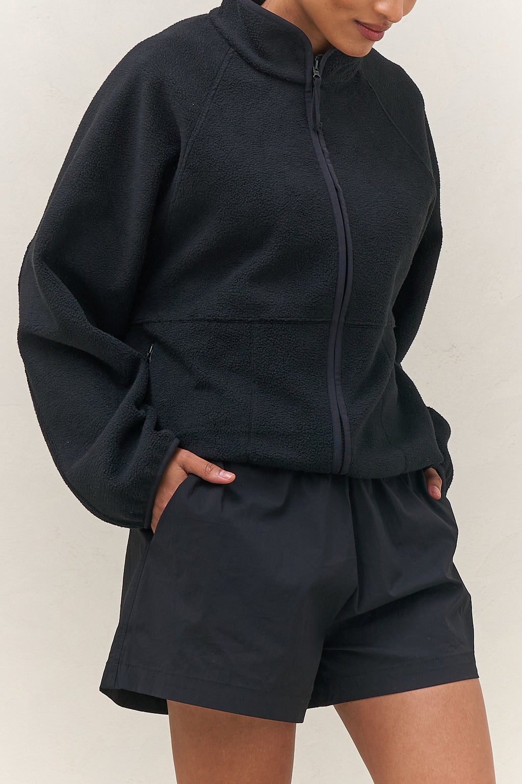 Fleece Zip Sweat - Black in mid-weight fleece with a stand collar and bind detailing for a relaxed, casual vibe.