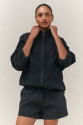 Fleece Zip Sweat - Black in mid-weight fleece with a stand collar and bind detailing for a cozy, modern fit.