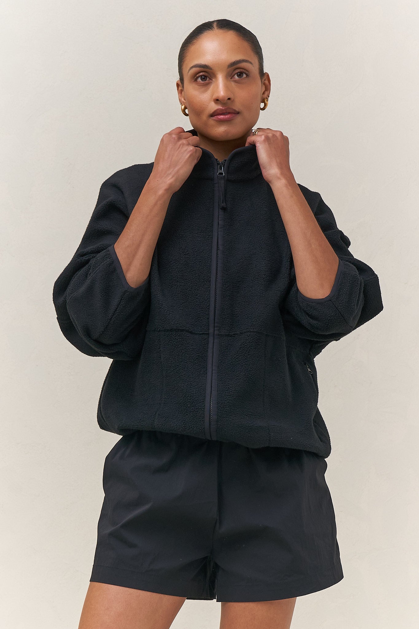 Fleece Zip Sweat - Black in mid-weight fleece with a stand collar and bind detailing for a cozy, modern fit.