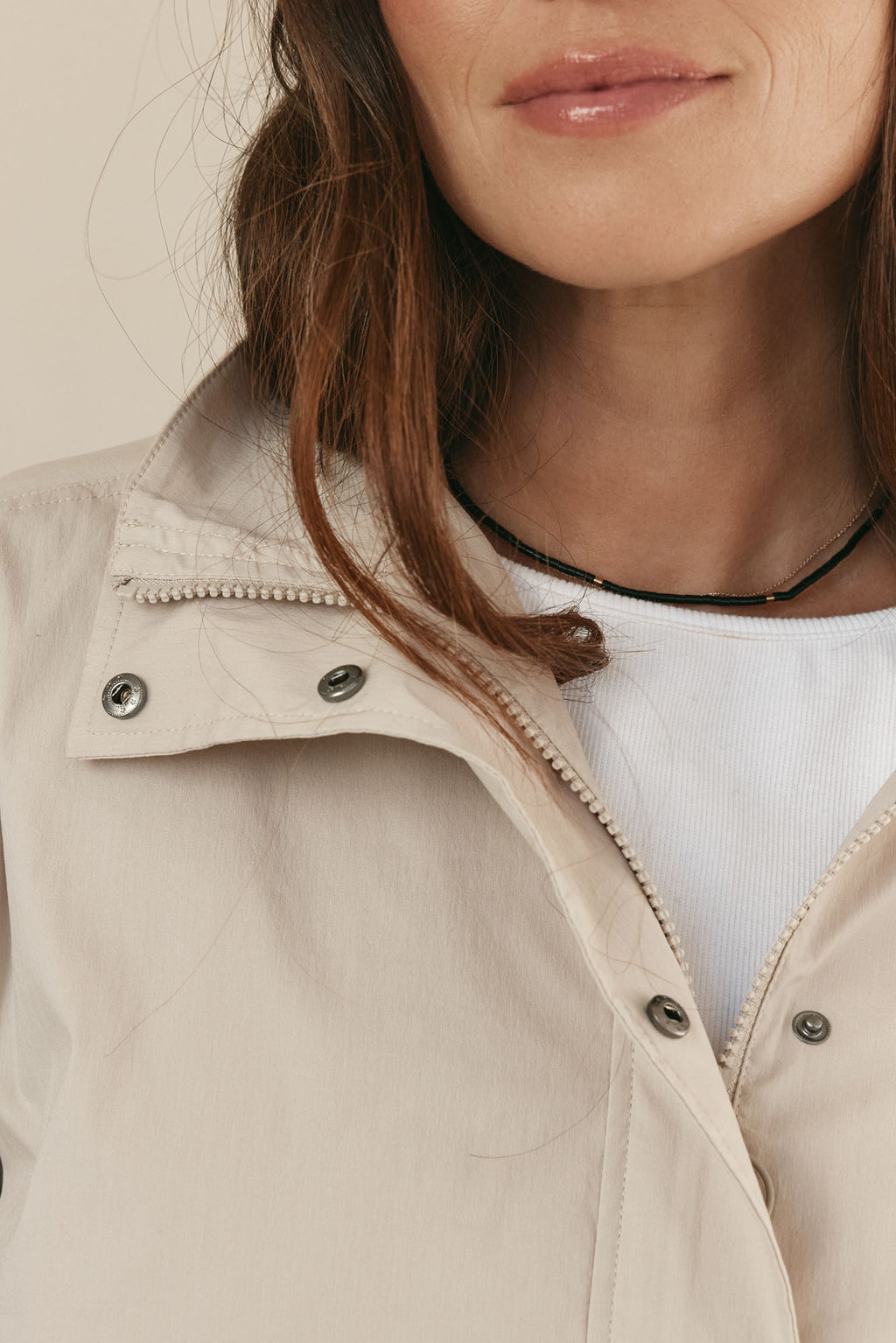 Nylon track jacket - Bone in a soft cream shade with snap buttons and a lightweight, durable fabric for easy layering.