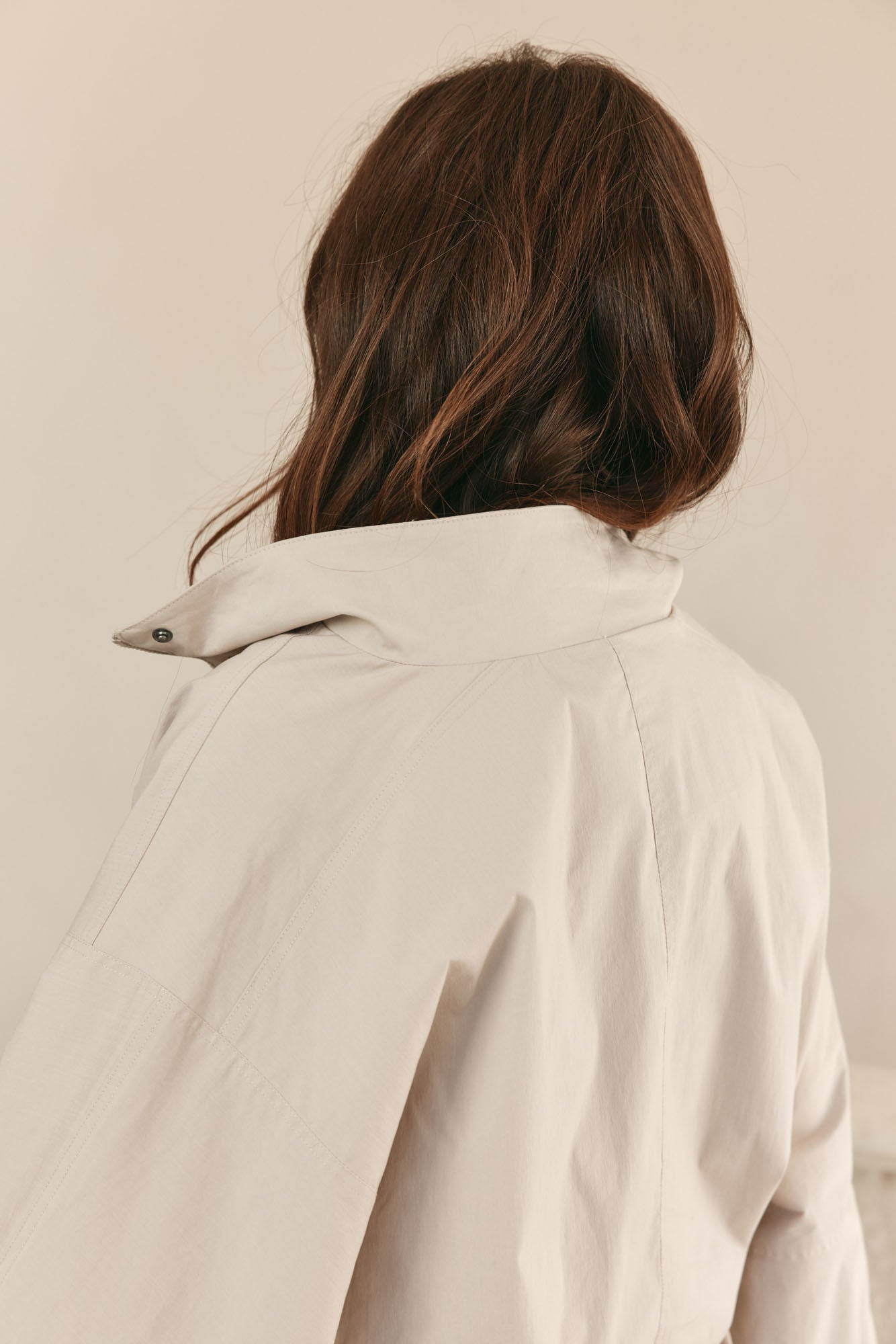 Nylon track jacket - Bone in a soft, durable fabric with a relaxed fit and a snap-button collar for easy layering.