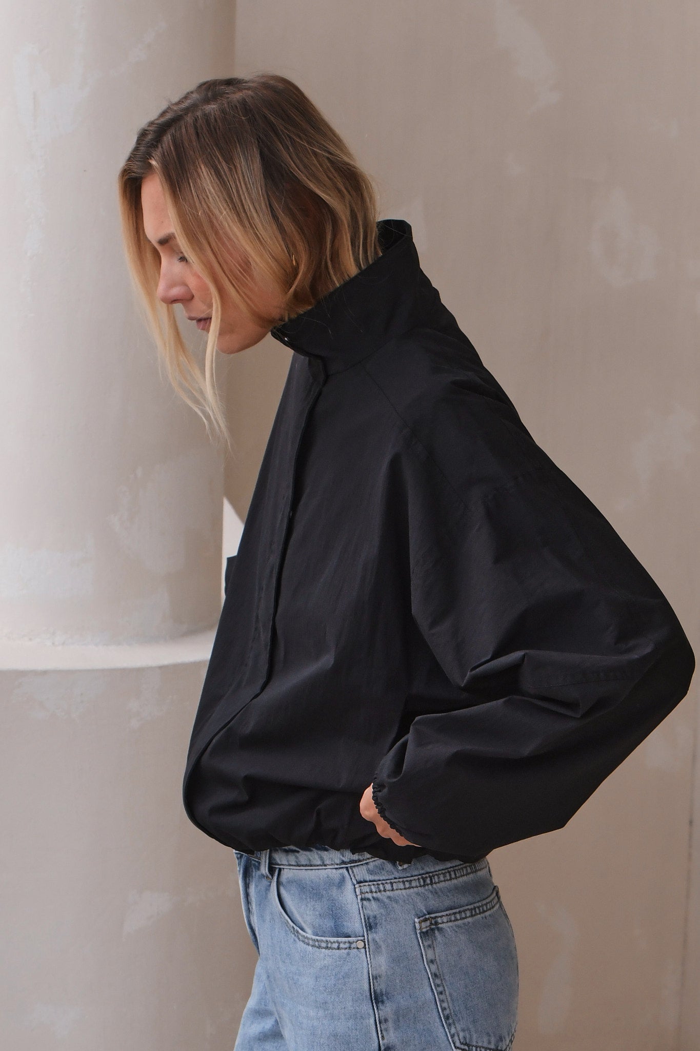 Nylon Track Jacket - Black with a relaxed fit and high collar, crafted from durable fabric for a timeless casual look.