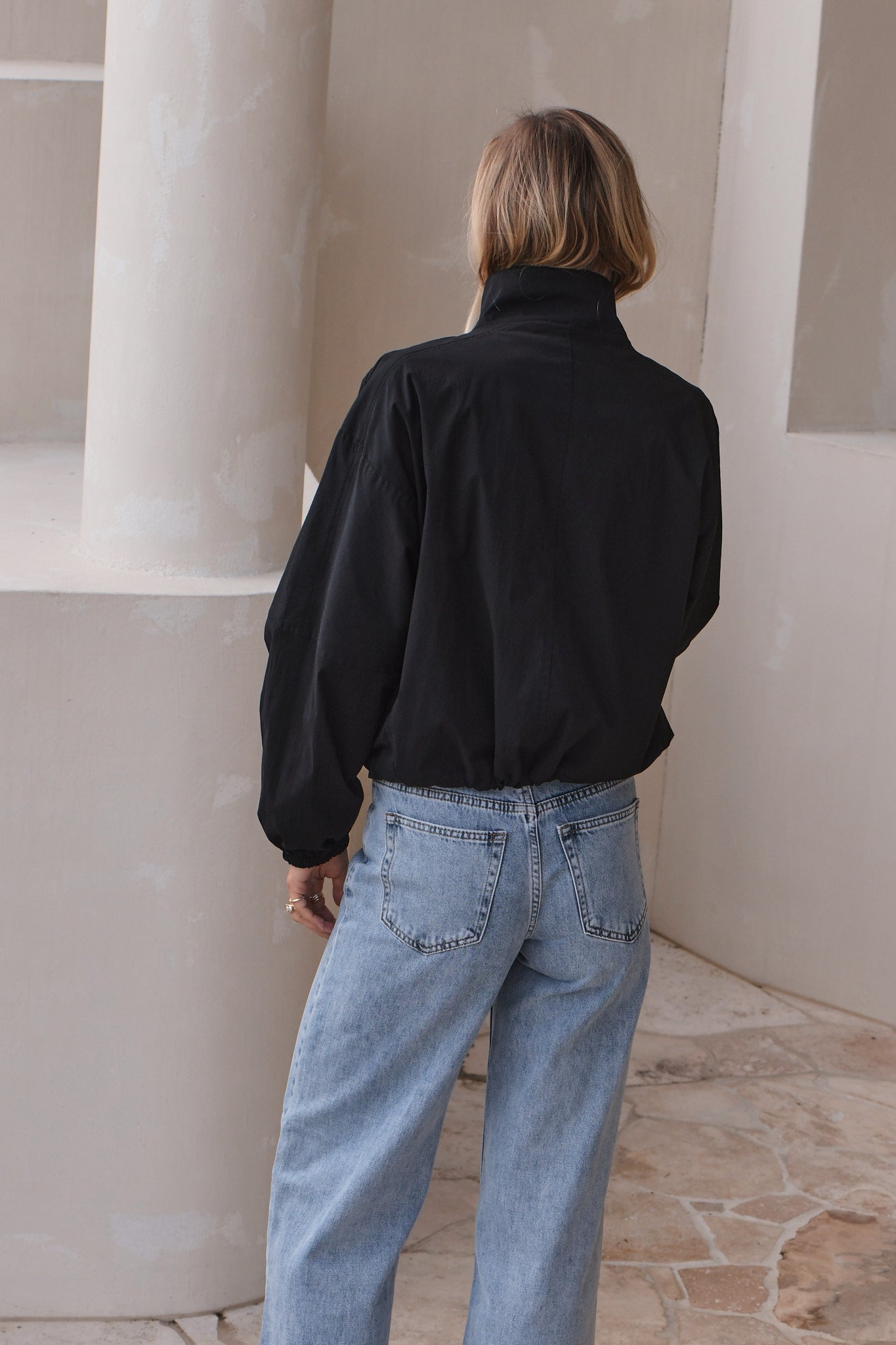 black Nylon Track Jacket - Black with a relaxed fit and slightly gathered hem for a modern casual vibe