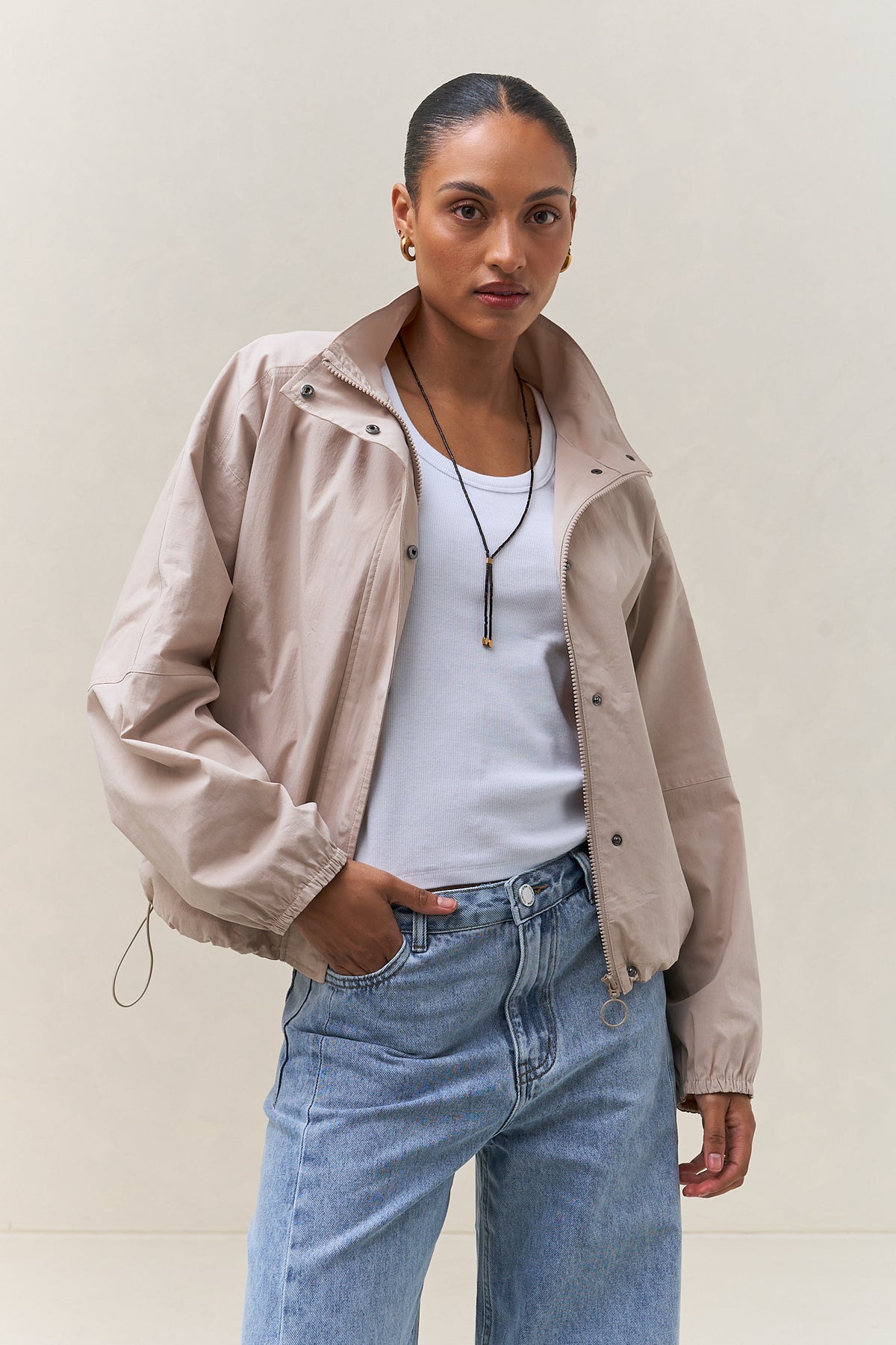 Nylon Track Jacket - Bone, lightweight bone nylon shell jacket with stand collar and adjustable waist for a custom fit
