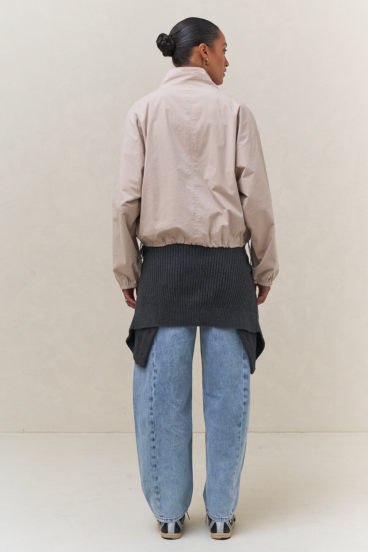 Nylon Track Jacket - Bone, a lightweight bone nylon track jacket with a stand collar and adjustable hem