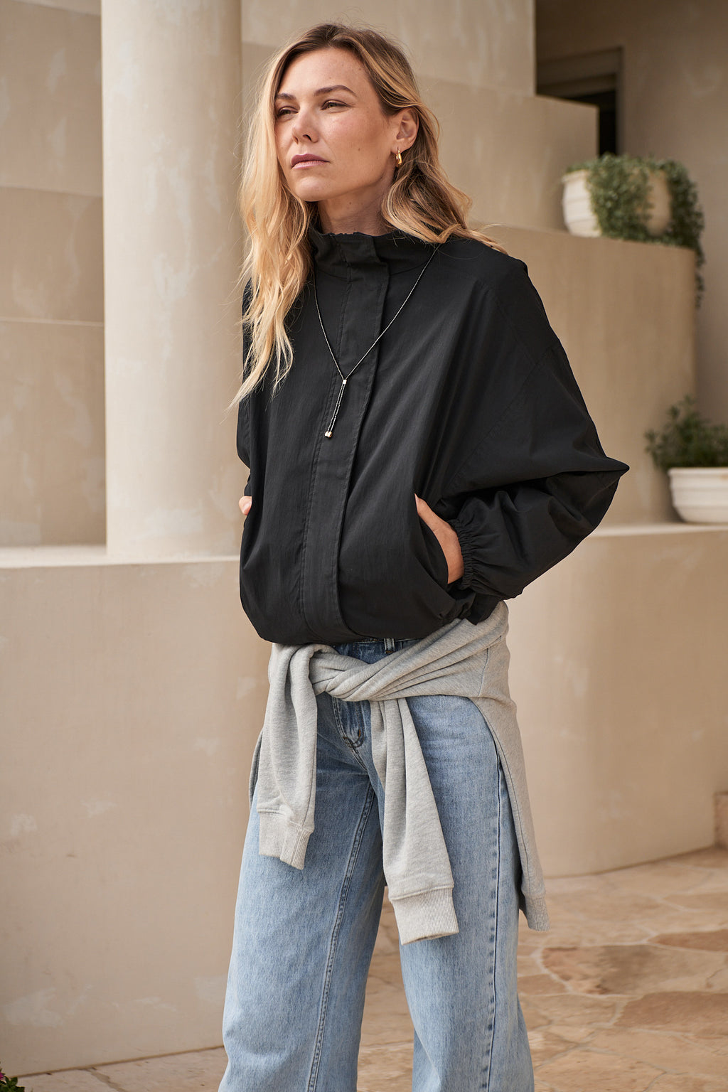 Nylon Track Jacket - Black with a relaxed fit and zip front, crafted from durable nylon for a casual, effortless vibe.