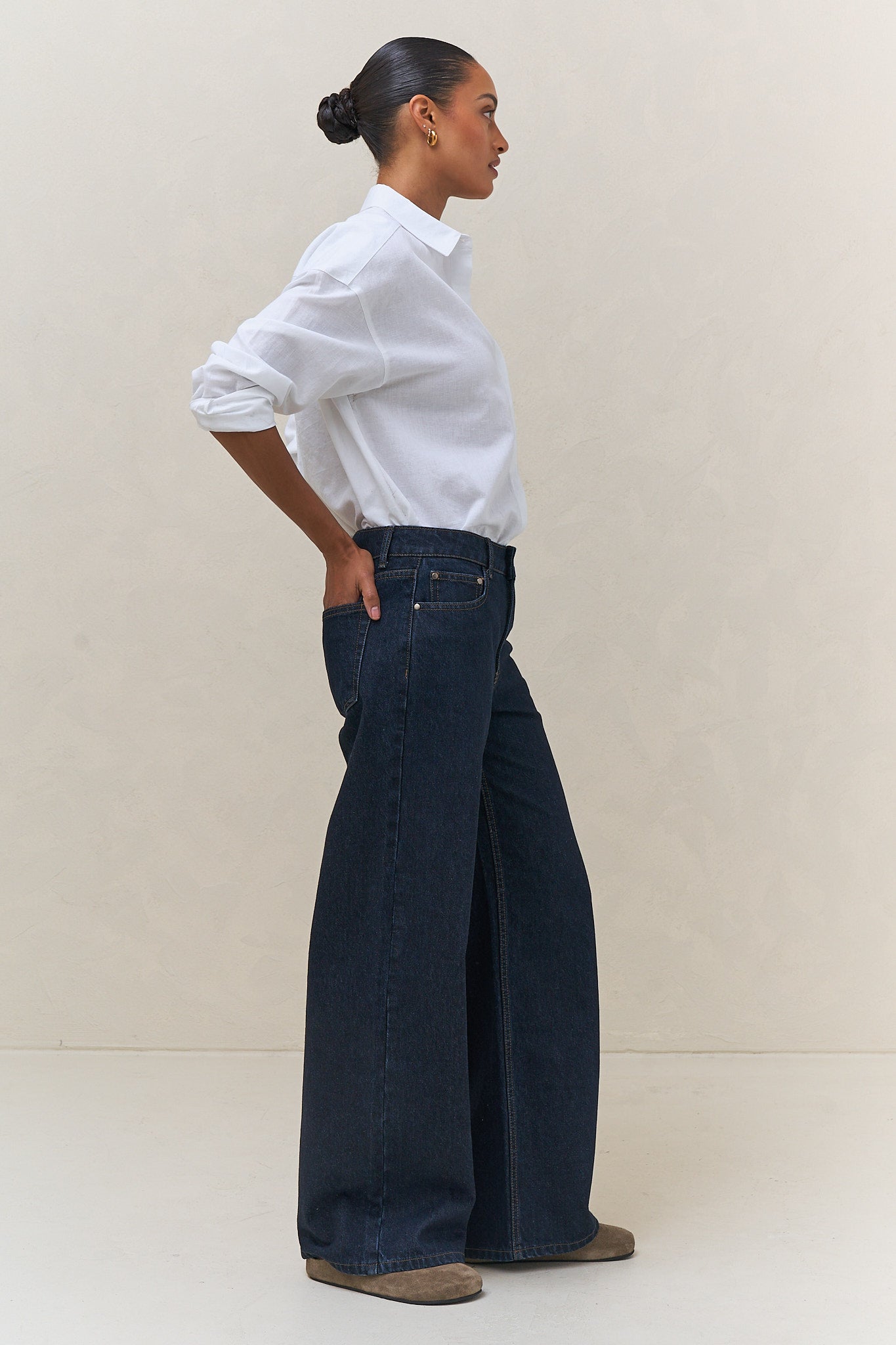 Mid Rise Wide Leg Jean - Indigo in rigid denim with a fitted waist and hip, falling wide and clean for a sharp silhouette