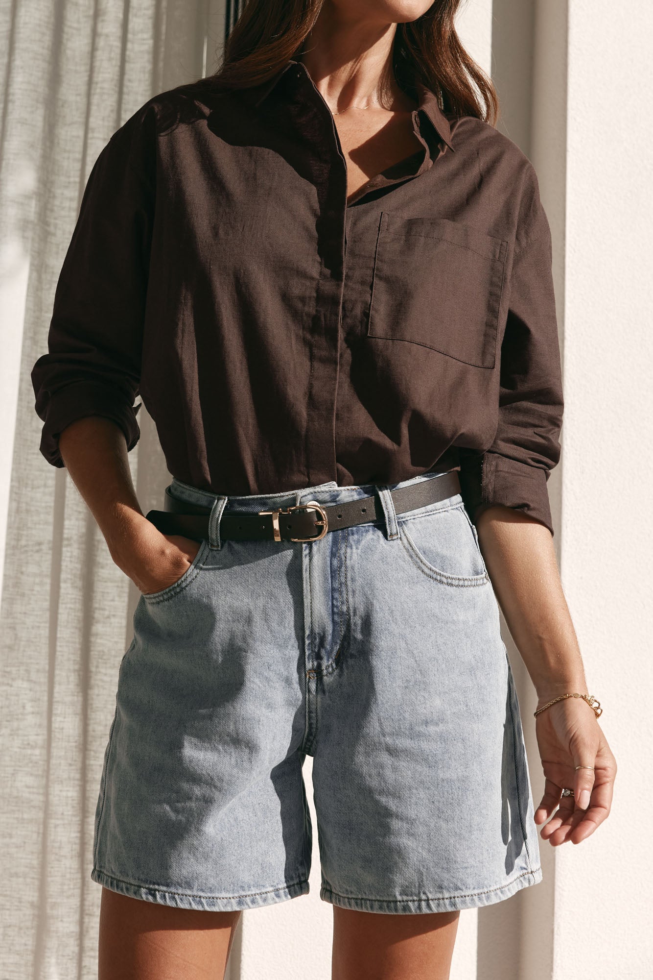 Mid Rise Denim Short - Light Blue in rigid denim that holds its shape with a classic, versatile silhouette.