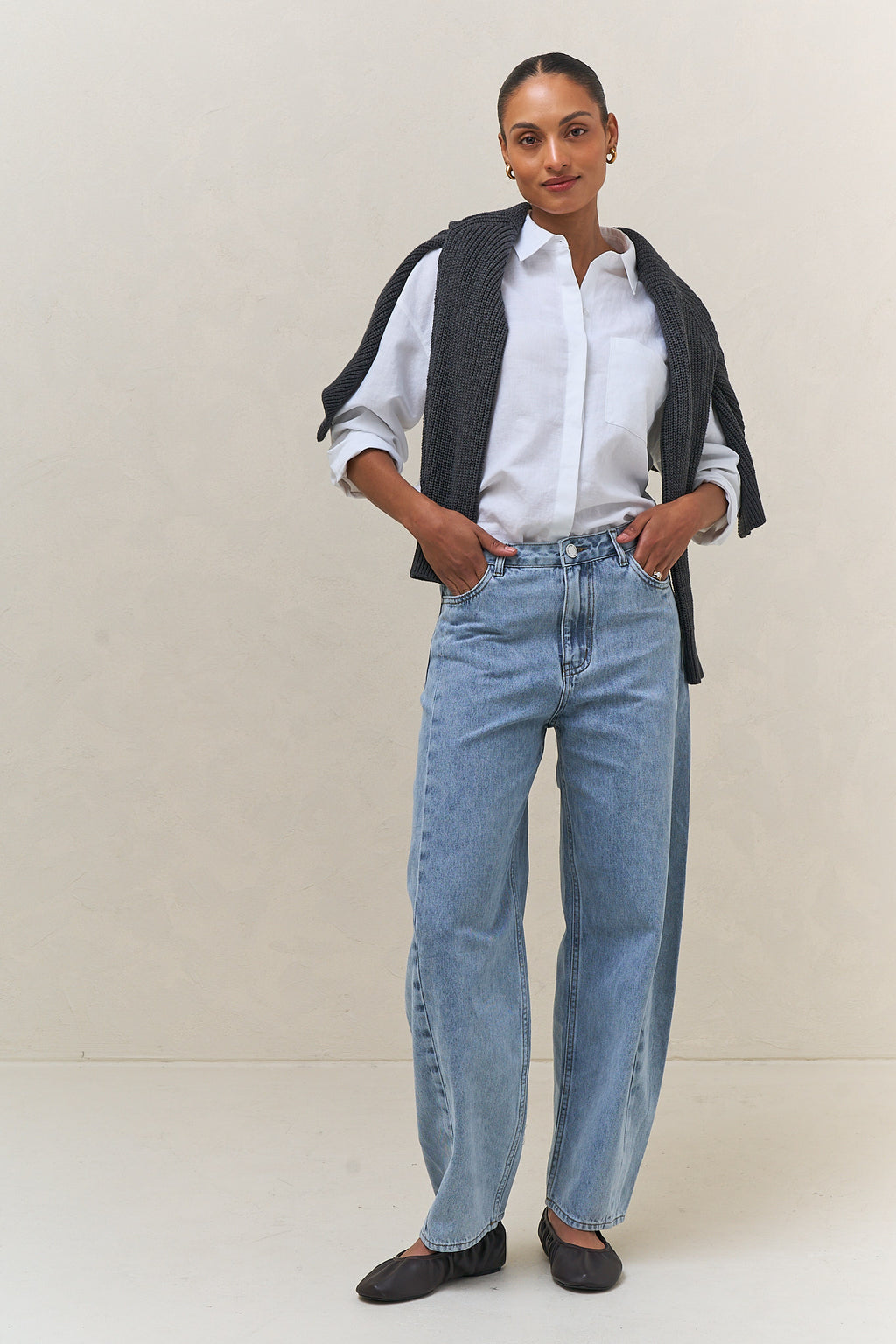 Mid Rise Barrel Jean - Light Blue in classic denim with a relaxed barrel leg for a laid-back, timeless feel.