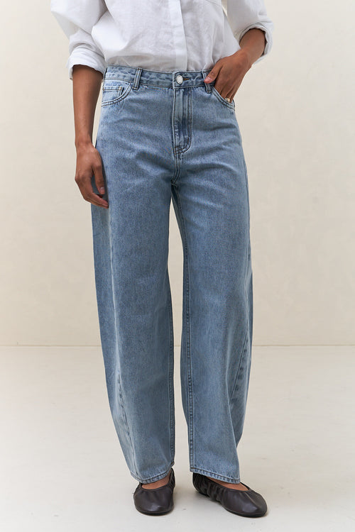 Mid Rise Barrel Jean - Light Blue in soft denim with a relaxed fit and slightly flared leg for easygoing everyday wear.
