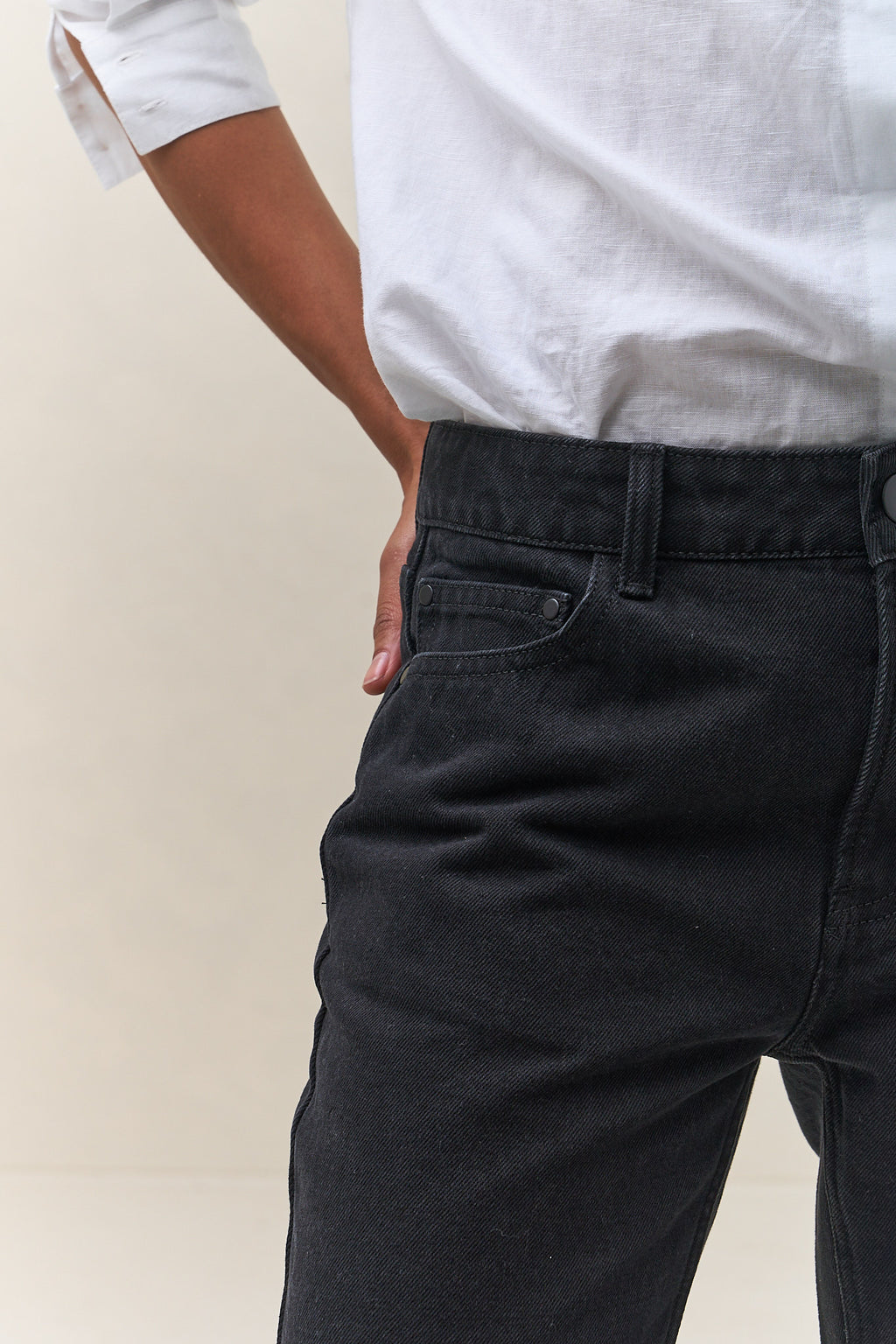 Mid Rise Straight Jean - Black in firm denim with a slim, straight leg that holds its shape through wear.