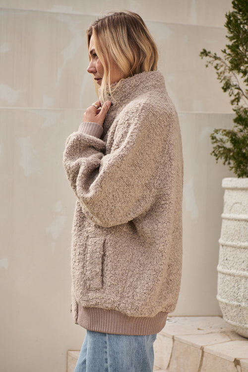 Wool Bomber Jacket in a soft beige boucle wool blend with ribbed cuffs and hem for a cozy layered look.