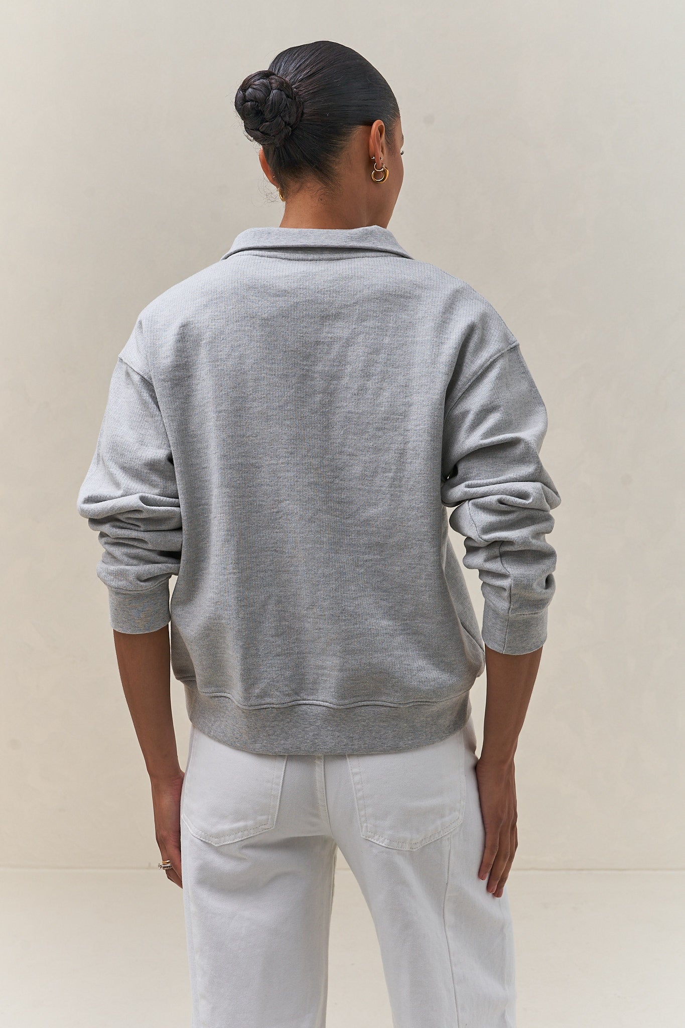 grey cotton polo sweat with a relaxed fit and structured collar, made from soft cotton for a laid-back feel