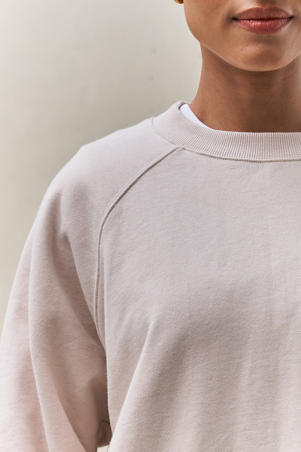 Basic Crew Sweat - Stone in soft cotton with a relaxed fit and classic crew neck for comfortable casual layering.