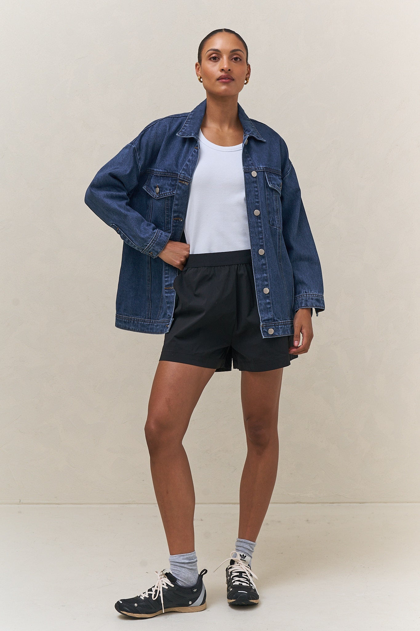 Nylon Track Short - Black with an elastic waistband for an easy, comfortable fit and a sleek casual vibe.