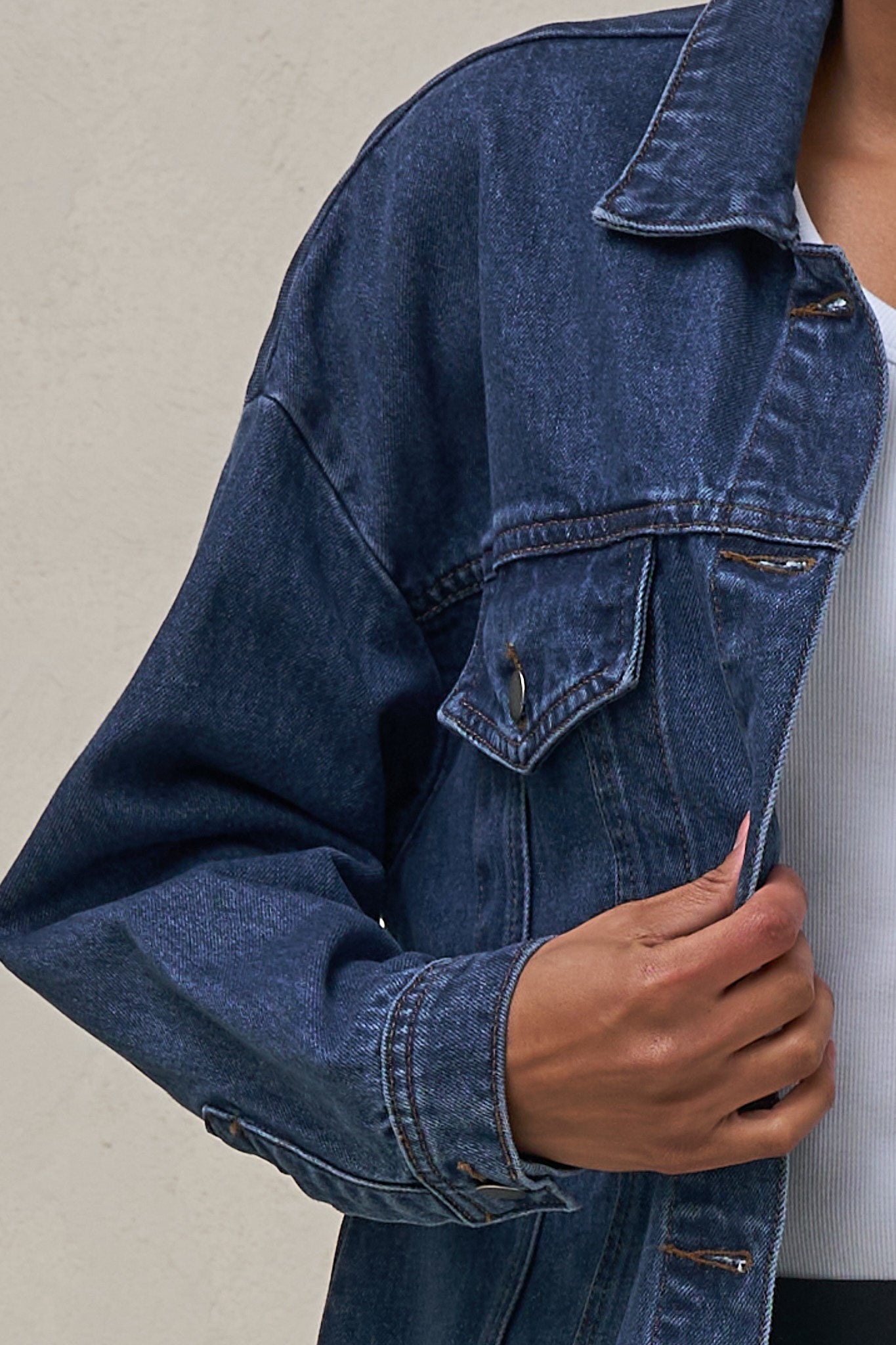 Denim Trucker Jacket - Mid Blue with rigid denim fabric and classic chest pockets for easy layering without losing shape.