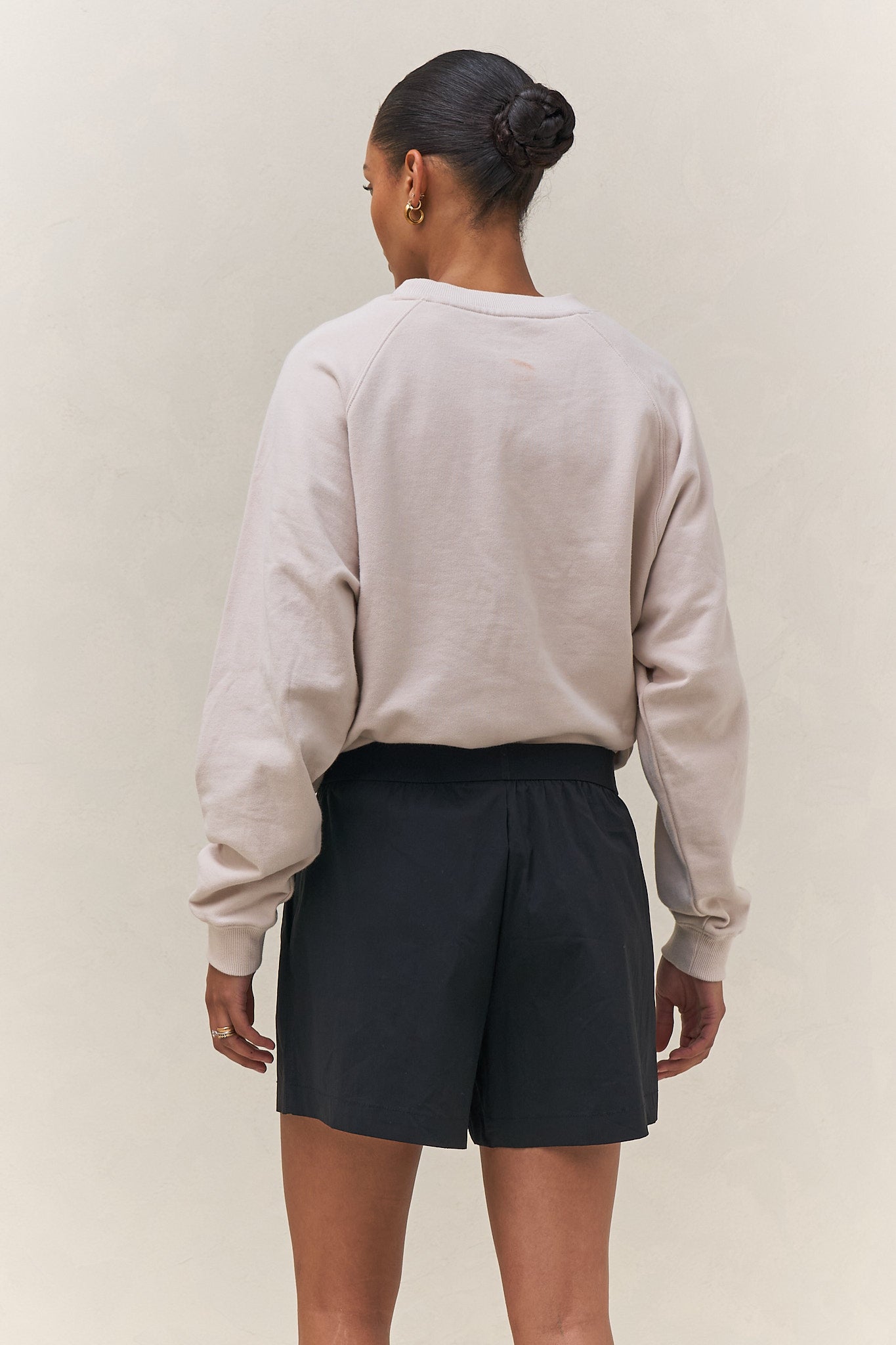 Nylon Track Short - Black in a lightweight nylon fabric with a relaxed fit and elastic waistband for easy, everyday comfort.