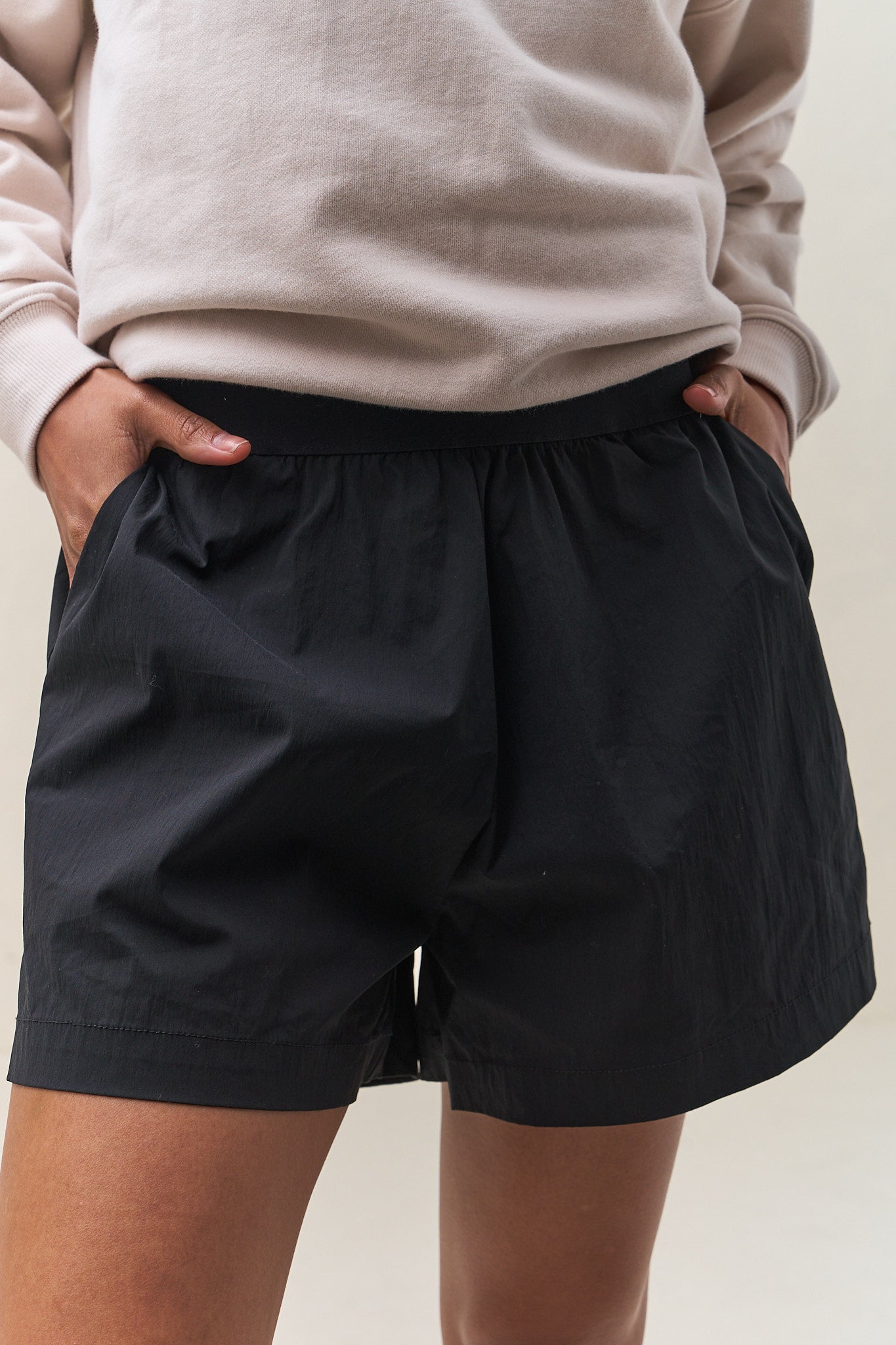 Nylon Track Short - Black with a relaxed fit and elastic waistband for easy comfort and everyday movement.