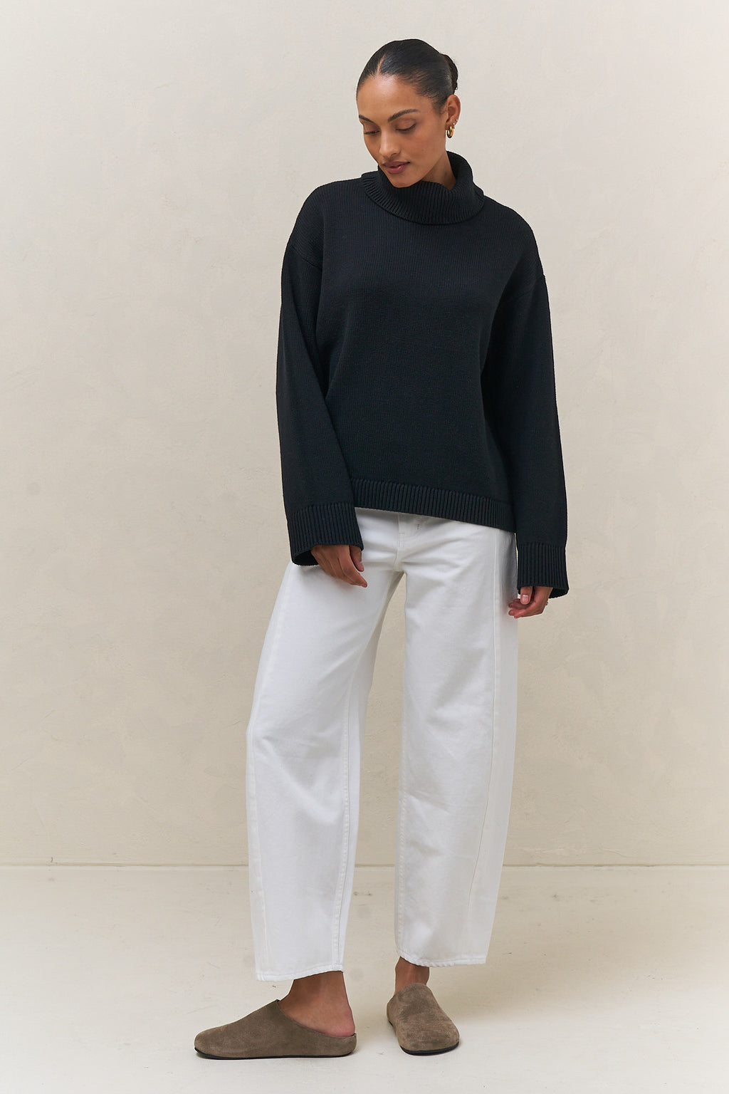 Mid Rise Barrel Jean - White in rigid denim with a fitted hip and gently rounded leg for a modern casual vibe.