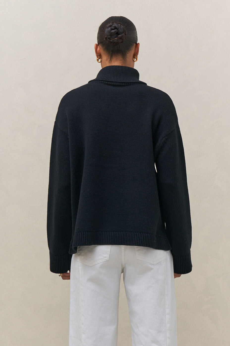 Merino Cotton Roll Neck Jumper - Black in soft knit with a relaxed fit and ribbed collar, cuffs, and hem for easy layering.