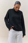 Merino Cotton Roll Neck Jumper - Black in soft knit with a relaxed fit and a cozy roll neck for easy layering.