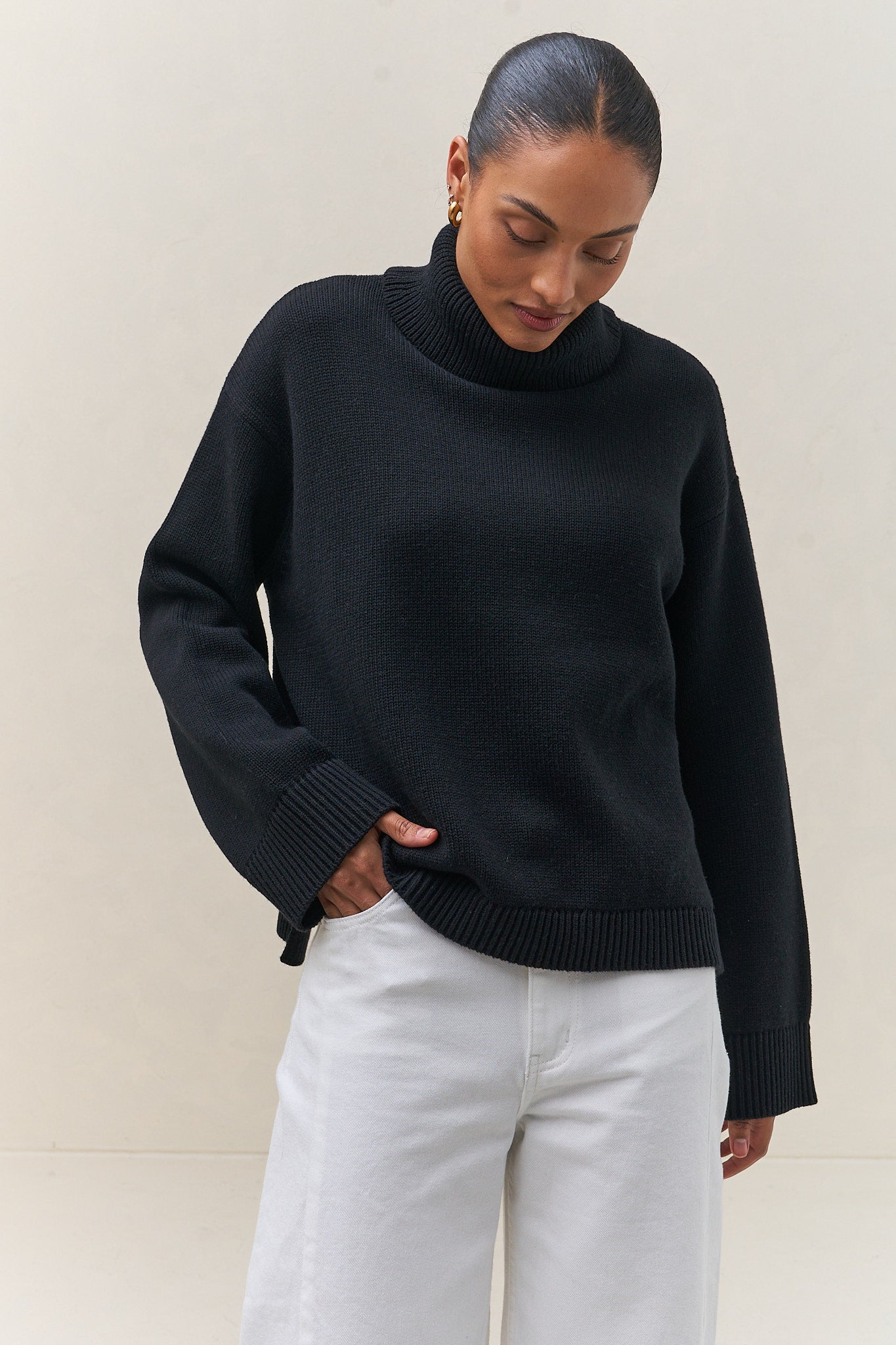 Merino Cotton Roll Neck Jumper - Black in soft knit with a relaxed fit and a cozy roll neck for easy layering.